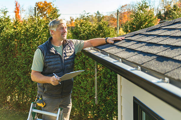 Professional Hail Damage Roof Repair technician working in Thornton, CO